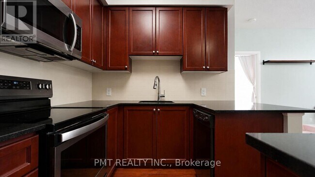 Photo - 125 Village Green Square Unit 309