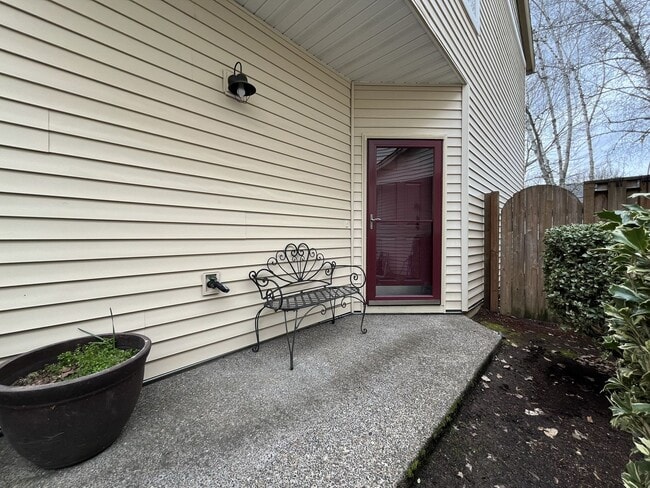 Photo - Inviting Two-Story 3BR Home Featuring Gas Range, Walk-In Closet, and Built-In Deck Seating