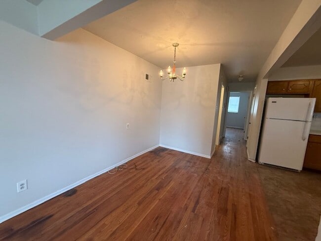 Photo - Charming 2-Bedroom Duplex with Modern Upda...