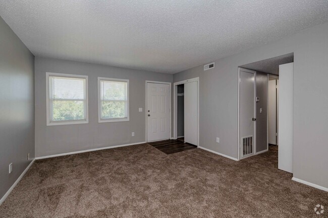 2BR, 1BA - 825SF - Living Room - Pine Creek Apartments