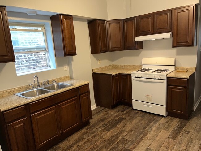 Building Photo - 6833 S Ada St Unit 1st. Floor