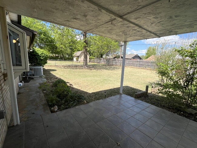 Photo - "Charming Space in Yukon, OK! Lawn care included!"