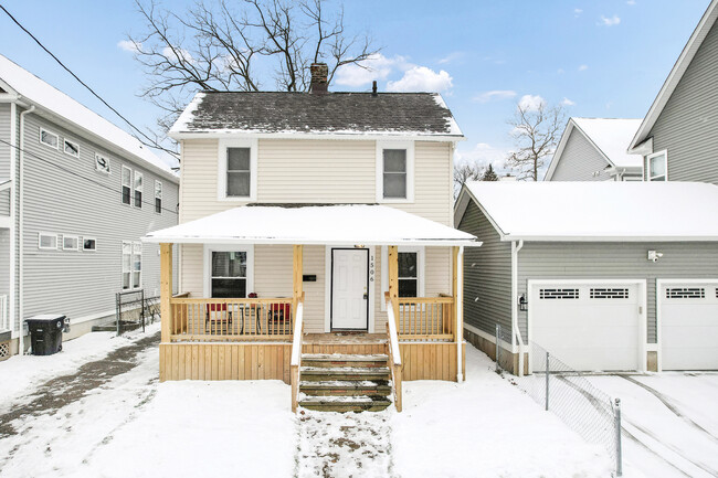 Vinyl Siding & Inviting Porch - 1506 E 123rd St House