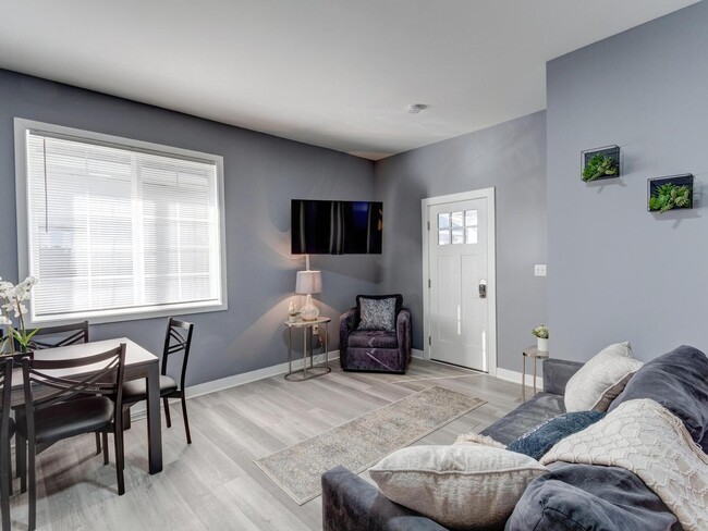 Building Photo - Spacious Modern Home | Stylish Comfort Nea...