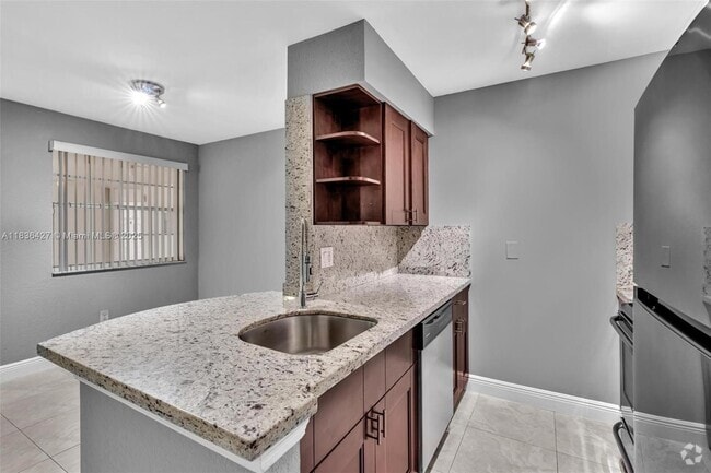 Building Photo - 2880 N Oakland Forest Dr Unit 213 Rental