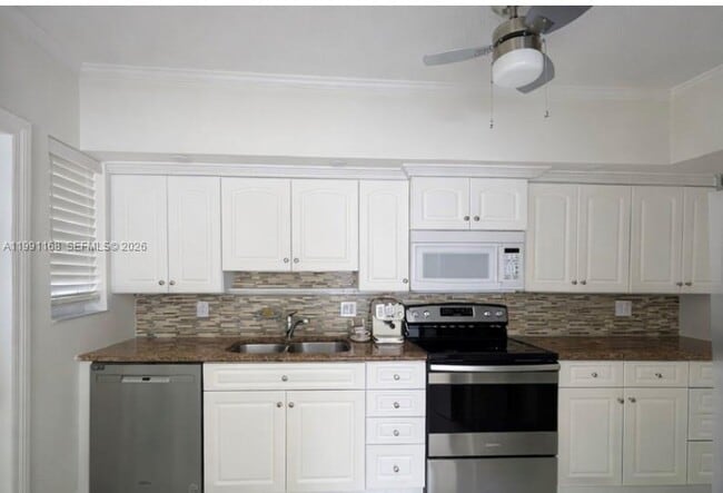 Photo - 462 Golden Isles Dr Unidad 210