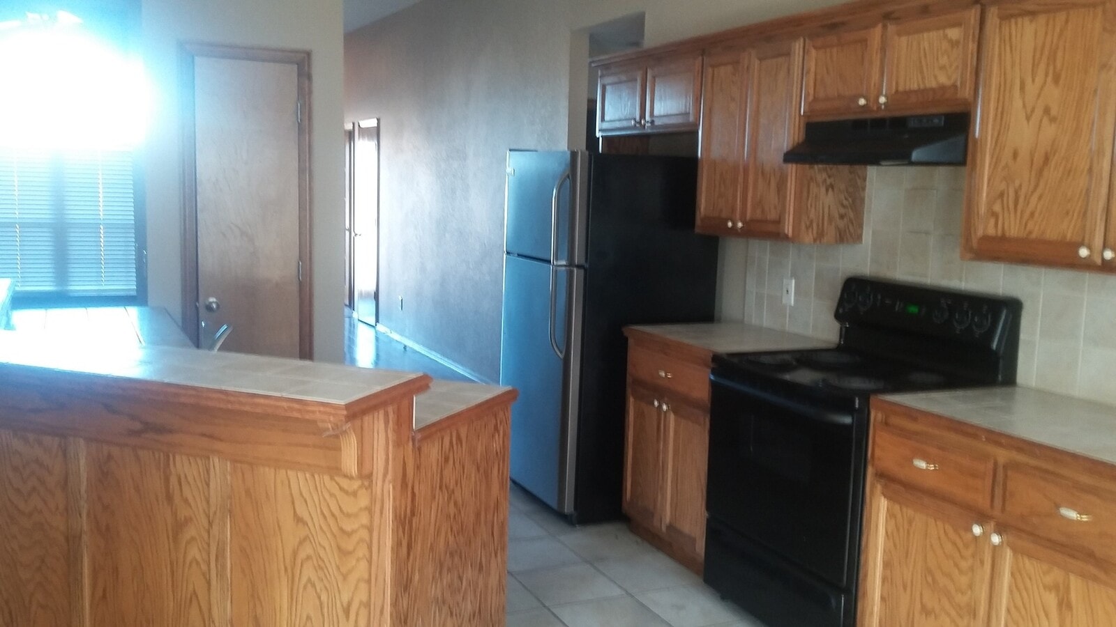 Photo - Spacious 4 bed, 2 bath, 2 garage home just 1.5 miles from OU Campus