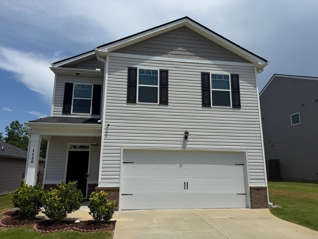Building Photo - Open concept 4 bed, 2.5 bath home with fen...