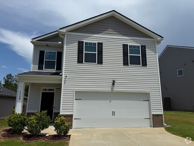 Building Photo - Open concept 4 bed, 2.5 bath home with fen...
