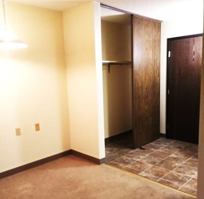 Front hall storage and vinyal flooring - Indian Guide Terrace