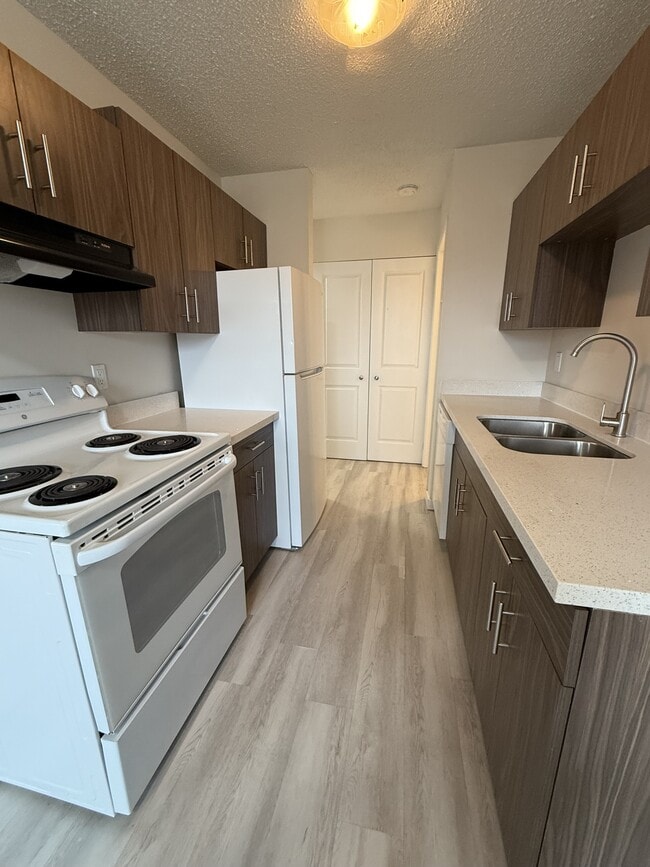 Building Photo - 9208-9106 Avenue NW Unit GC-419