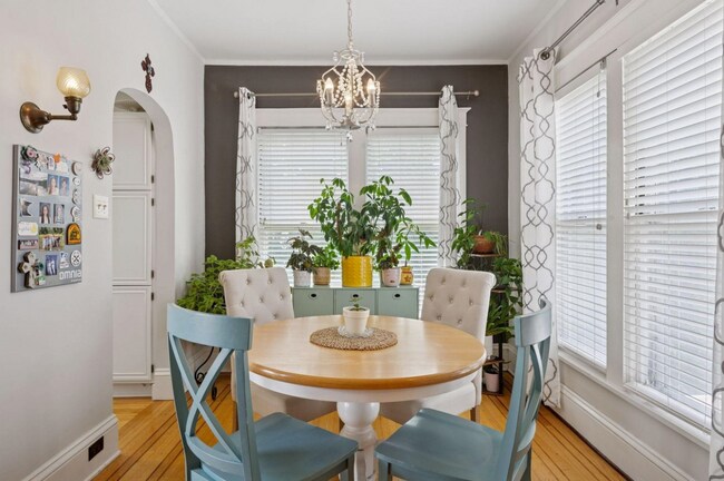 Dining room. Full kitchen is off to the left. If you're a plant-parent, this is a dream come true. - 2601 Portland Ave