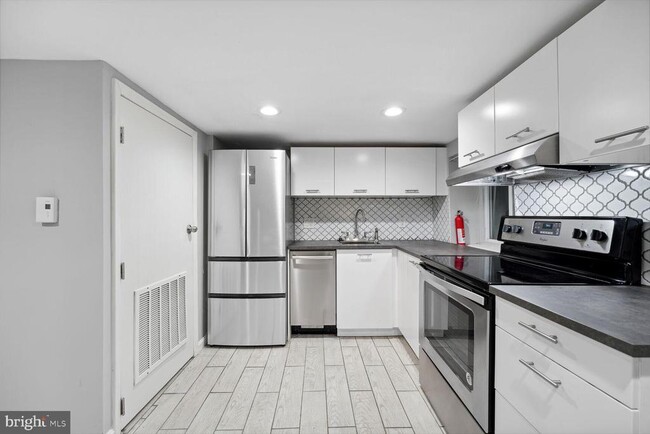 Building Photo - 768 Quebec Place NW Unit C