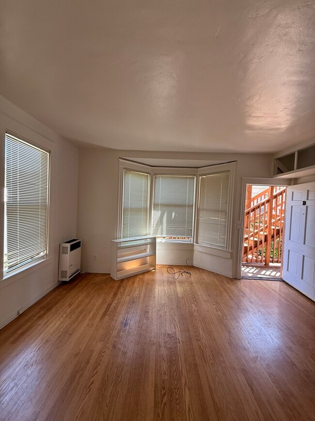 Living Room - 2801 Fulton St Apartments