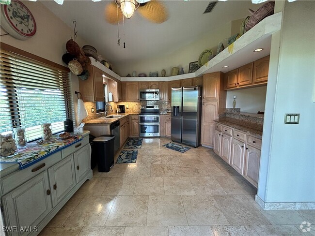 Building Photo - 16540 Heron Coach Way Unit 405 Rental