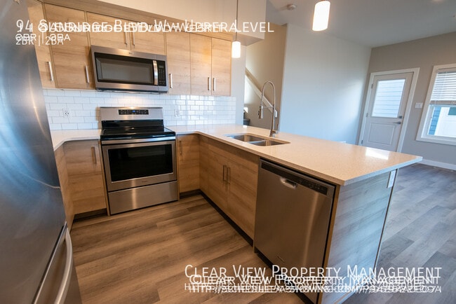 Photo - Amazing 2 bedroom, 2 bathroom suite with zero scaped yard! ??Showings available NOW at (306) 774-... Unit Upper Level