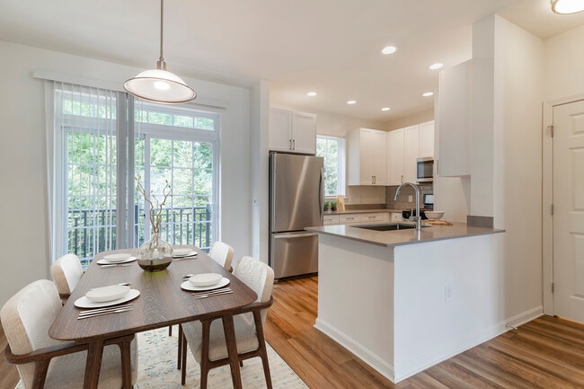 Renovated Package II kitchen and dining area with hard surface flooring