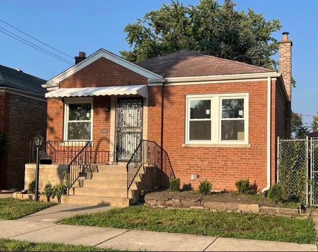 Building Photo - 10317 S Peoria St Rental
