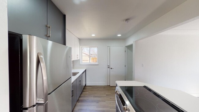 Photo - Renovated Park Hill brick home with large ...