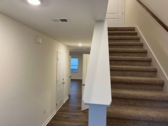 Photo - Beautiful New Construction 3 bedroom 2.5 Condo   with garage- Water, trash & sewer incuded!