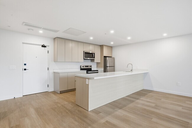 Photo - 2 Bedroom + Den  & 3 Bedroom Apartment Unité 209