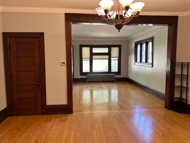 living room/dining room - 1045 S Webster Ave Apartments Unit 1