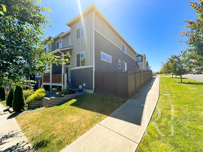 Photo - Modern End-Unit Townhome with Private Fenced Yard, Gourmet Kitchen & Spacious Layout