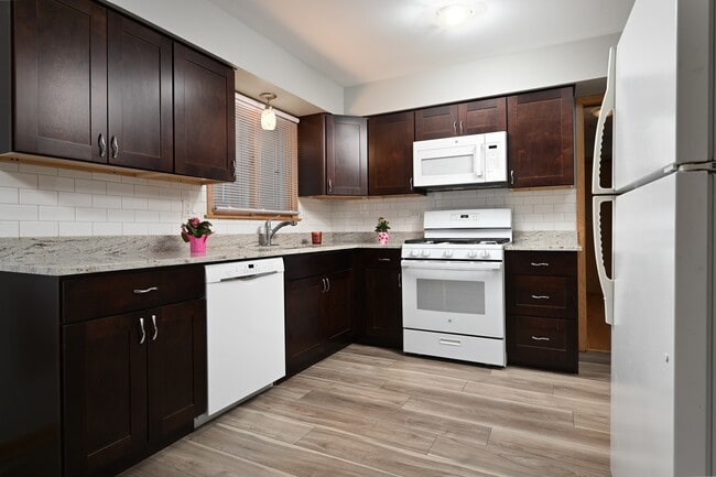 Photo - 5850 N Mulligan Ave Unidad 1