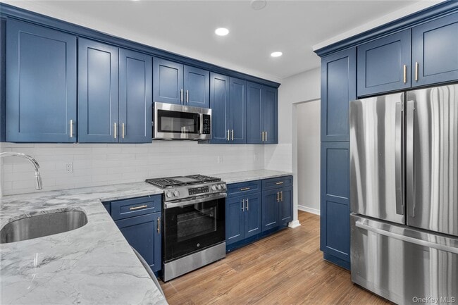 Photo - 840 E Broadway Unidad upper