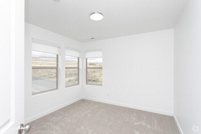 3BR, 2.5BA - 1,332SF - Second Bedroom - Innovation Park at Holbrook Farms