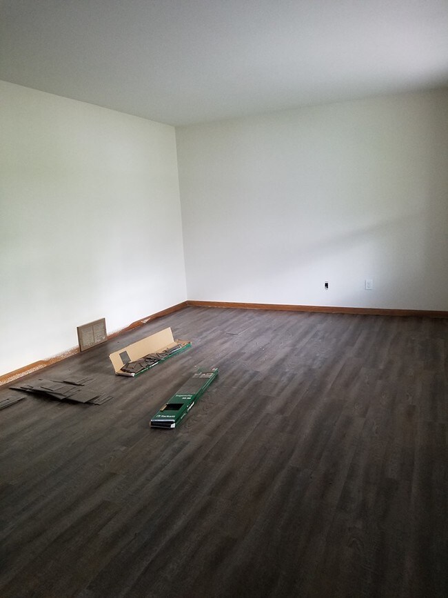 Living Room with new floor and paint - 217 S Water St
