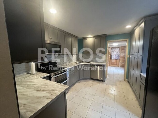 Photo - Charming 3-Bedroom Brick Home in North Park Hill – Spacious Yard & Finished Basement