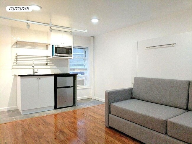Photo - 310 W 20th St Apartamento