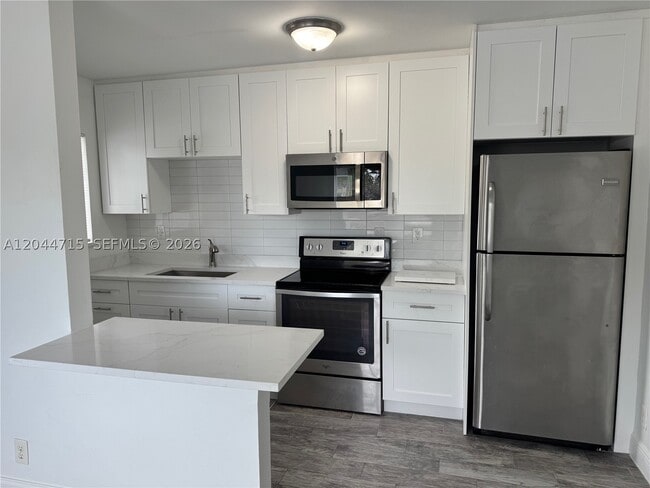 Building Photo - 495 NW 43rd St Unit 1