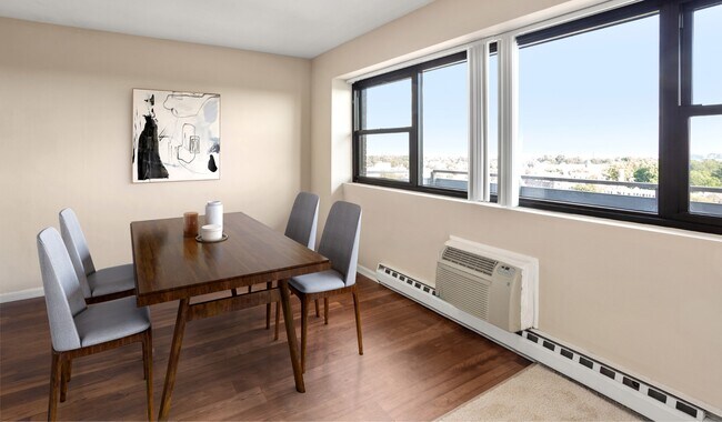 Su comedor es un espacio acogedor y agradable diseñado para comidas informales y reuniones especiales. - Vista Apartment Homes