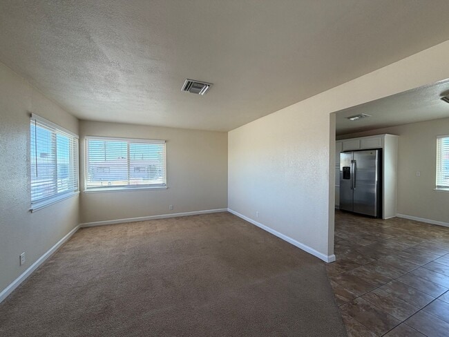 Photo - 3 Bedroom 2 Bathroom House with Central A/C , 2 Car Garage and Beautiful Backyard with Covered Patio