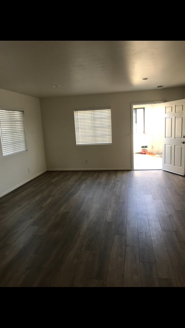 Standing against back wall looking at front door - 12420 Oxnard St Unit Studio Rental