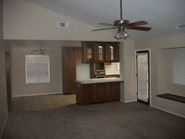 Photo - Coming Soon: Spacious Renovated 3 Bedroom Rosedale Home with Pool, Dual Fireplaces & Covered Patio