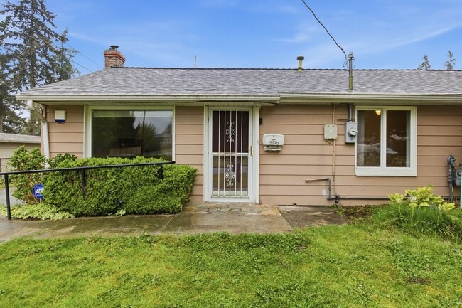 Photo - Cozy 4-Bedroom Home with Wood Stove & Large Backyard in Mountlake Terrace