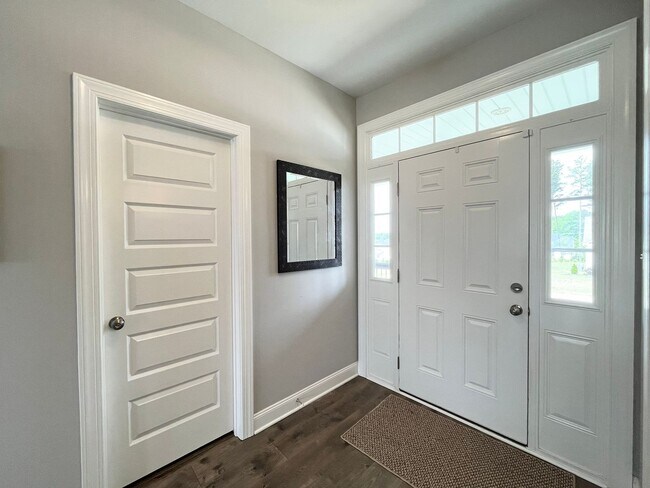 Photo - Private 4BR, 2.5BA Home with Modern Finishes, Back Deck and Large Yard, on a Nearly Half Acre Lot