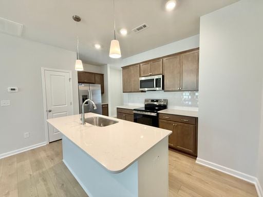 Photo - **OFFERING REFUNDABLE APPLICATION FEES** New Construction 3BD, 2.5BA Garner Townhome with a 1-Car...