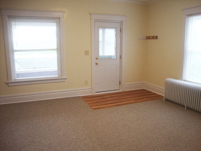 Looking at the front entry door in the Living Room (13'3" x 16'6"). - 14 E Weber Ave Unit 14