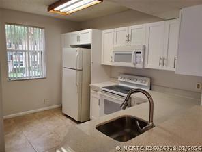 8871 Wiles Rd Unit 207