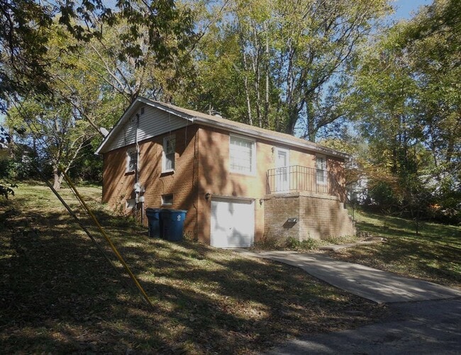 Building Photo - Two Bedroom House with Drive Under Garage!
