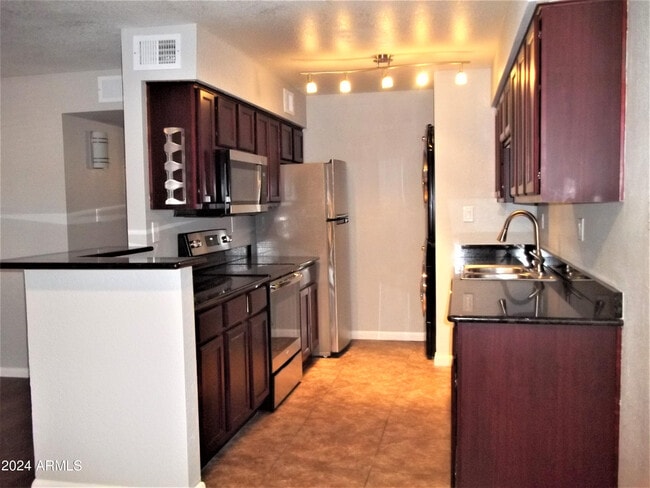Photo - 5995 N 78th St Unit Apt 1092