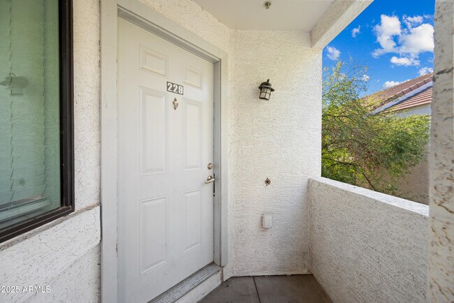 Building Photo - 3065 N 67th Ave Unit 229