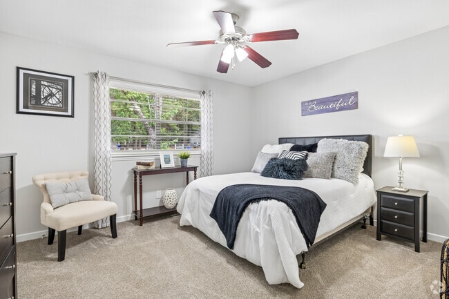 2BR, 1.5BA - 1,030SF - Primary Bedroom - Booker Creek - Students save up to 10%!