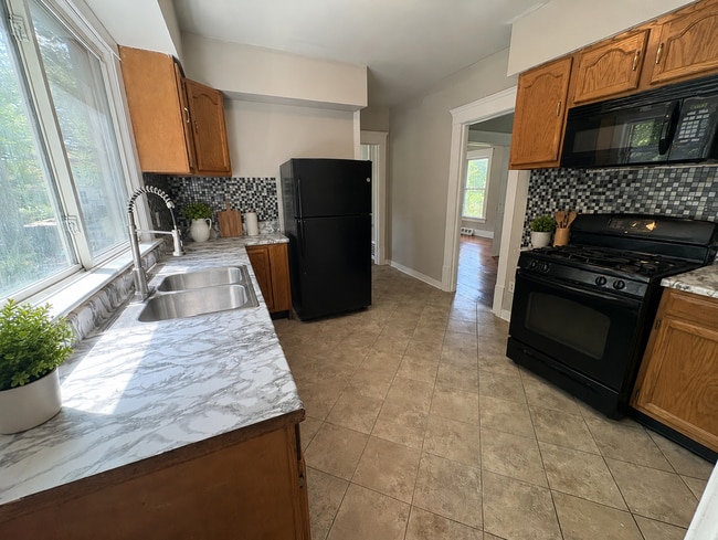 Photo - Large 5-Bedroom Akron Rental with Formal Dining Room and Full Basement