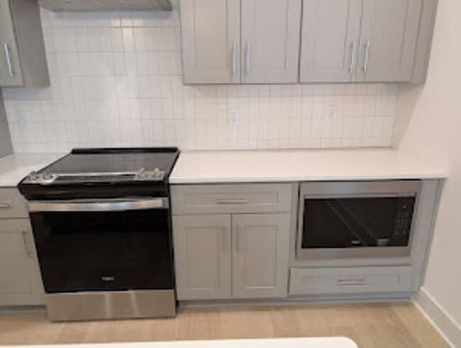 Photo - New construction three-story townhome offe...