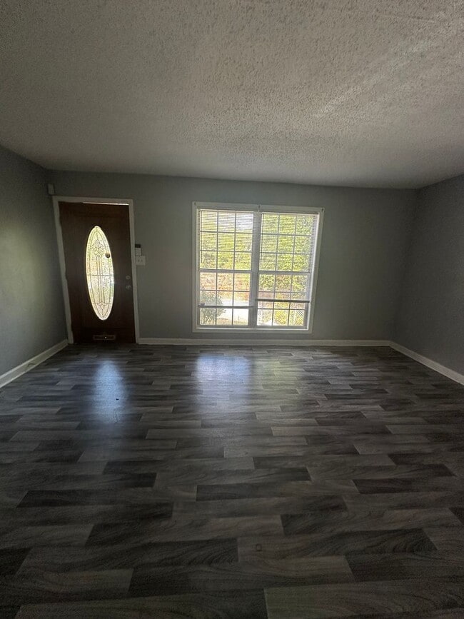 Photo - 3 bedroom 2 bath renovated home with a huge family room!